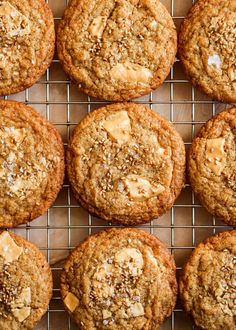 several cookies are cooling on a wire rack