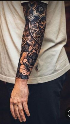 a man with a tattoo on his arm