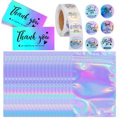 holographic stickers, labels and other items are arranged on a white background