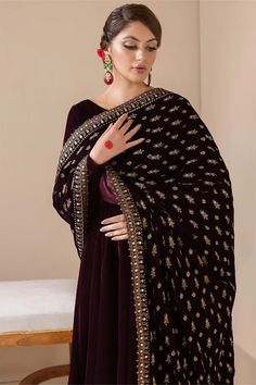 Orignal Designer Embroidered Velvet Shawl with lining on back. All over rich embroidery work on soft velvet with accessories shawl is perfect for any occasion. Elegant evening shawl will add instant glamour and refinement to your ensemble. This shawl is very easy to pair with salwar suit or long dress. Includes: 1 Piece Shawl Only Maroon Velvet Size 2.65 Yards Embroidered Velvet Shawl with accessories Includes : Shawl only with Accessories Dispatch Time: 1-3 Business Days