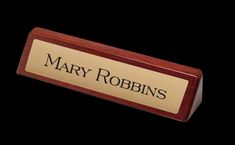 a wooden plaque with the name mary robin's on it