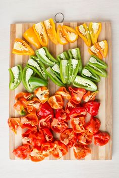 sliced bell peppers on a wooden cutting board