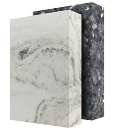 a white marble block sitting next to another block