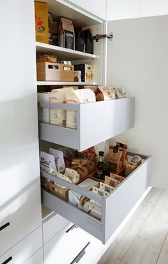 an open pantry with lots of food in it