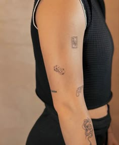 a woman with a tattoo on her arm