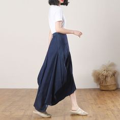 "★★ FEATURES 70% cotton, 30% terylene Linen skirt Elastic back waist Two big pockets Asymmetrical skirt Long Linen skirt High low skirt Maxi skirt Perfect for summer,spring,autumn Wash by hand or machine with cold water ★★ The model's height approx 165cm (5′5″) with the 84cm (33\") bust, 66cm (26\") waist. She is wearing a size XS ★★ Please select custom order according to the follow situation Request similar length effect as model wear Your height is not between 155cm and 175cm Your weight is not between 47kg-77kg ★★ Get your size in Size Chart with your body measurement https://www.etsy.com/listing/794055682 ★★ Warmly Note: 1 ) : Please confirm your shipping address! If you wish to ship the item to a different address, please send me a message immediately after purchase. We can't change Summer Cotton Wrap Skirt With Pockets, Casual Cotton Wrap Skirt In Relaxed Fit, Cotton Gathered Skirt, Asymmetrical Summer Skirt With Pockets, Summer Asymmetrical Skirt With Pockets, Casual Summer Wrap Skirt With Wide Legs, Baggy Cotton Skirt For Summer, Casual Asymmetrical Gathered Skirt, Casual Summer Skirt With Loosely Fitted Hips