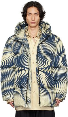 Insulated quilted nylon taffeta jacket. Graphic pattern printed throughout. · Bungee-style drawstring at hood · Stand collar · Two-way zip closure · Welt pockets · Zip vent at side seams · Velcro tab at elasticized cuffs · Patch pocket at interior · Fully lined Supplier color: Blue Quilted Jacket Outfit, Dries Van Noten Menswear, Taffeta Jacket, 2000s Fashion Trends, Blue Puffer, White Quilt, Dries Van Noten, Sportswear Women, Quilted Jacket