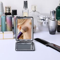 an assortment of cosmetics and other items on a table