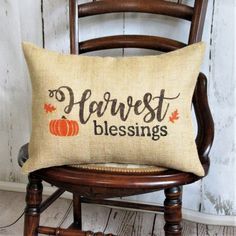 a chair with a pillow that says harvest blessing