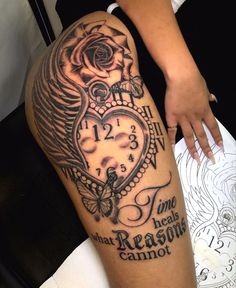 a woman with a tattoo on her leg that has a clock and roses in it