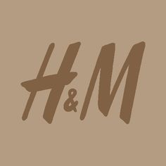 the h & m logo is shown on a tan background with brown letters and black lettering