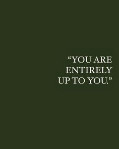 the words you are entirely up to you on a dark green background with white lettering