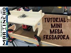 a table that has some tools on it and the words'mini mesa fresadora '