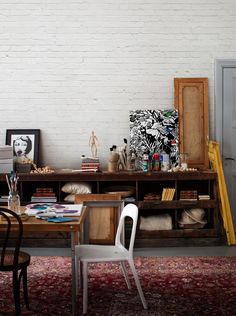 a living room filled with furniture and decor