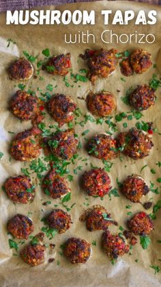 mushroom tapas with chorizzo and parsley on parchment paper, ready to be eaten