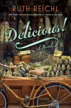 a book cover with an image of a bicycle and some other items on the table