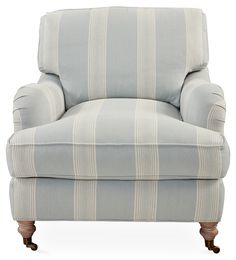 a blue and white striped chair on a white background