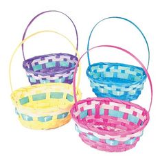 three baskets with different colors and designs on them