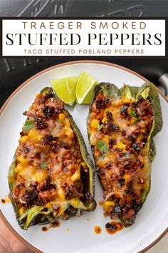 two stuffed peppers on a white plate with a lime wedged in the middle and text overlay that reads, trader smoked stuffed stuffed peppers taco stuffed poblaas