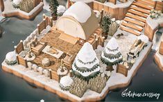 an aerial view of a snow covered village