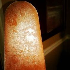 a long piece of bread sitting on top of a counter