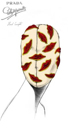 a drawing of a person's head with red and yellow designs on it