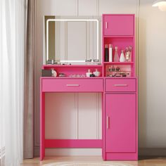 a pink vanity with mirror and lights in a room