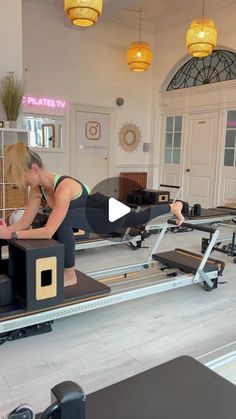 a woman is doing exercises on a treadmill