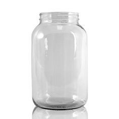 an empty glass jar on a white background