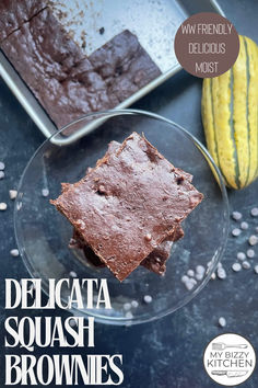 the cover of delectata squash brownies is shown on a plate with other ingredients