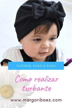 a baby wearing a turban with the words como realizar turboante