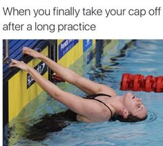 a woman is swimming in the water with her hand on the side of the pool