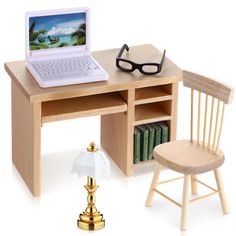 a laptop computer sitting on top of a wooden desk next to a chair and lamp