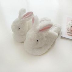 Description With Unicorn🦄 and Rabbit🐇 Slippers in the winter, you won't be suffering from chill toes.👣❄️ These cute slippers are best for you and also for your kids. Made with the finest quality material, these are designed in a perfect unicorn shape that your children would love😍. Ladies would also love to wear this beautiful white and pink pair. Get these lovely slippers to have a warm and comforting feel while wandering about in your home. These fluffy slippers🦄 is the most suitable choi Fluffy Bunny Slippers, Rabbit Slippers, Winter Cartoon, Fluffy Shoes, Unicorn Slippers, Slippers Womens, Fur Sandals, Bunny Slippers, Dr Shoes