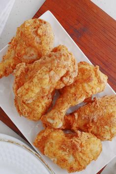 some fried food is on a white plate