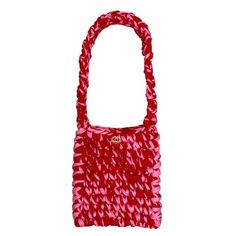 a red handbag on a white background