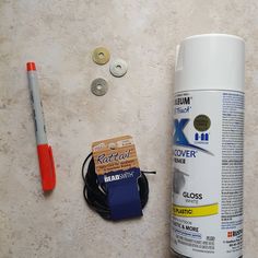 the contents of a craft project including glue, scissors and other items