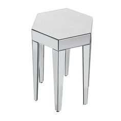 a mirrored side table with two legs