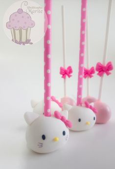 hello kitty cake pops with pink and white polka dots