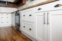 This 13-in. W x 28-in. H x 3/4-in replacement premium quality shaker kitchen wall cabinet door is made from medium density fiberboard (MDF) finished with white rigid thermofoil (RTF). This replacement cabinet door fits most 15-in and 30-in wide framed kitchen wall cabinets. When measuring for a replacement cabinet door and plan on using the same overlay hinge, take a measurement of the back side of your existing cabinet door by measuring the width first, followed by the height. Rigid thermofoil Kraftmaid Cabinets, Thermofoil Cabinets, Cabinet Door Replacement, Shaker Style Cabinet Doors, Shaker Cabinet Doors, Paint Cabinets White, Custom Cabinet Doors, Clean Kitchen Cabinets, Kitchen Base Cabinets