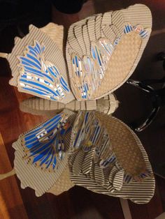 a pair of flip flops sitting on top of a table next to a mirror