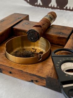 This cigar ashtray has been repurposed from a genuine WWII crate. The crate was originally used to house .50 caliber bullets. An indentation has been added for 1 cigar along with a removable ashtray. Let us know if you want a brass or stainless steel ashtray. ERA:1941-1945 CONFLICT: WWII COUNTRY OF ORIGIN: USA SPECS: The T1IDR ammunition crates housed 120 cartridges, .50 caliber, armor piercing incendiary M8. with 10 rounds per carton, 6 cartons per can with a total of 2 cans. The crates weight Cigars Accessories, Smoker Stand, Barrel Ideas, 50 Caliber, Vintage Ashtray, Golden Oak, Wine Barrel, Wood Shop, Cigars