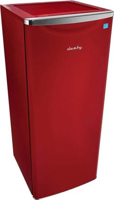 a red refrigerator freezer sitting on top of a counter