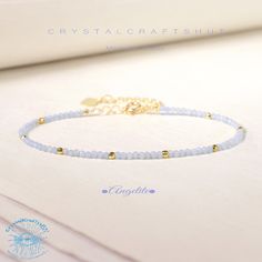 Angelite Minimalist Bracelet Light Blue Gemstone Delicate Beaded Skinny Bracelet Yoga Crystal Dainty Bracelet Adjustable 2MM Tiny Bead Stone Bracelet Gift Material : Angelite Stone, Natural Stones, Natural Crystal, Raw Stone Quality: AAA+ Length: fit for 6.3 ~ 7.3 inches wrists Beads size: 2mm Size: Adjustable It is good gift for your friends, families + Free gift pouch  Your bracelet will arrive beautifully packaged in a gift bag ,The bracelet is adjustable.  All beads are carefully selected. It is a unique and meaningful gift for yourself or someone special. Perfect cool gift that anyone will love! These happy bracelet can't help but make you smile! Add to cart today! this is one you might want to keep yourself, but would make a wonderful gift to anyone.    As you can see this is a real Light Blue Adjustable Dainty Jewelry, Elegant Friendship Bracelets With Colorful Beads, Minimalist Blue Beaded Bracelets For Gift, Elegant Blue Friendship Bracelets With Colorful Beads, Elegant Blue Friendship Bracelets With Round Beads, Light Blue Faceted Beads Bracelet As A Gift, Minimalist Beaded Crystal Bracelet Gift, Dainty Crystal Bracelet With Tiny Beads For Gift, Light Blue Faceted Beads Bracelets As Gift