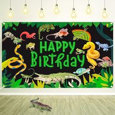 an image of a birthday card with dinosaurs in the jungle on black background and green lettering that says happy birthday