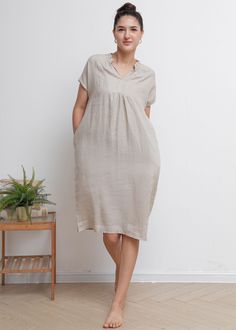 "Casual tunic dress versatile outfits. The organic linen fabric let you feels soft and breathable, wearing with big bag or sneaker for fun and casual look. ★★FEATURES 100% Linen Two side pockets Split v-neck dress Short sleeve Front pleated details Shift dress Casual dress Mama dress Simple dress Perfect for Summer, Spring ★★ Model Size Height approx 162 cm (5′ 4″) Bust 84 cm (33\") Waist 66 cm (26\") She wears size XS. ★★ Bespoke Order Service If you Request other color Request the length Your Beige Shift Midi Dress Knee-length, Casual Beige Linen V-neck Dress, Linen Shift Dress For Daywear, V-neck Shift Linen Dress, Beige Linen Tunic Dress, Linen Tunic Sewing Patterns, Casual Tunic Dress, Linen Design, Shift Dress Casual