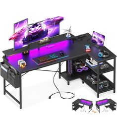 a computer desk with two monitors and keyboard on it, all lit up by purple lighting