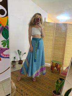 This unique wrap skirt is a one of a kind in the hole world ✨ The fabric goes on it's one unique story as it is a  one of a kind recycled vintage silk hand picked from unique places and villages 🌱 The fabric also  is so soft and silky and has so many small details that make just that much more Beautiful  ⚛️ It's a 2 in 1 skirt ! As you can where it in its 2 defrent sides✨ Skirt is great for every day, And also luxurious and Stunning for evening where. 🌞 Fabric is is the best thing about it, An Boho Print Tiered Skirt For Festival, Festival Boho Print Tiered Skirt, Traditional Summer Beach Wrap Skirt, Traditional Long Wrap Skirt For Beach, Blue Boho Print Maxi Skirt For Festival, Spring Hippie Wrap Skirt, Belly Dance Style Tiered Maxi Skirt For Festival, Multicolor Bohemian Wrap Skirt For Vacation, Bohemian Multicolor Wrap Skirt For Vacation