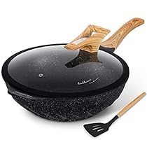 an image of a skillet and spatula set