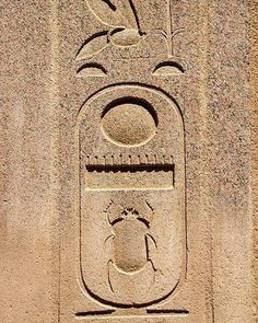 an ancient carving on the side of a building